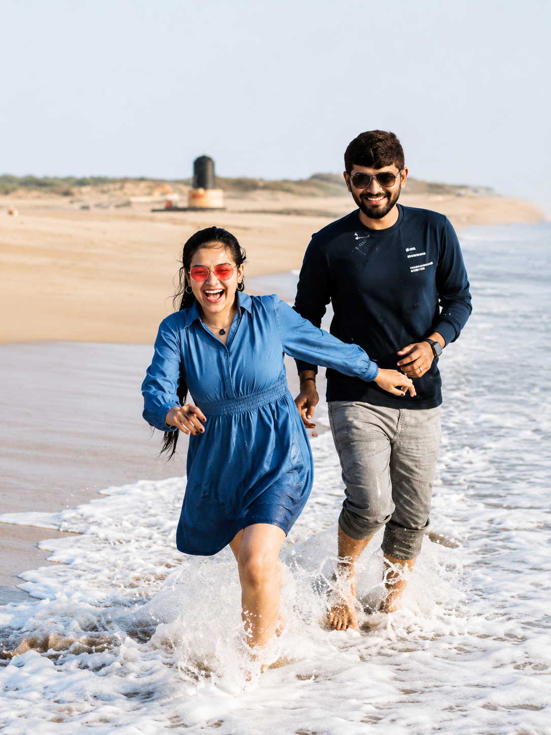Aelish & Darshana together by the sea